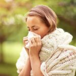 Young slim woman enjoys weight loss result